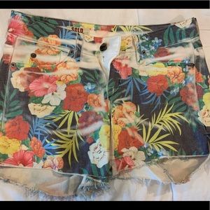 Floral patterned denim shorts